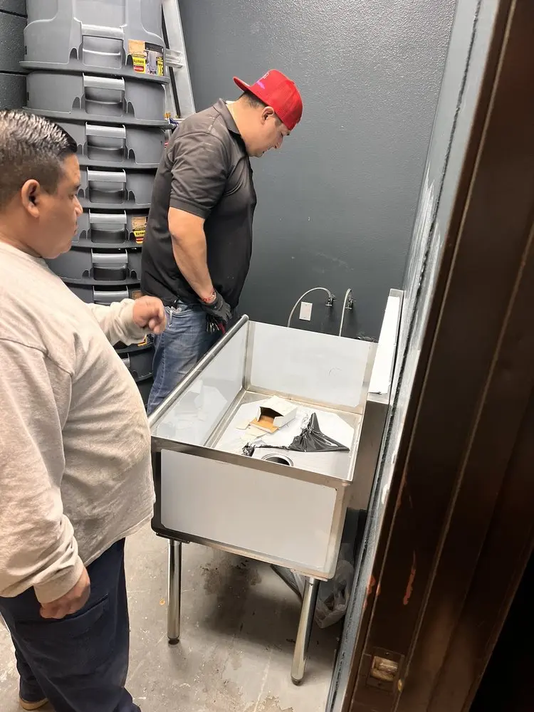 Commercial plumbing and sink installation in Alpha